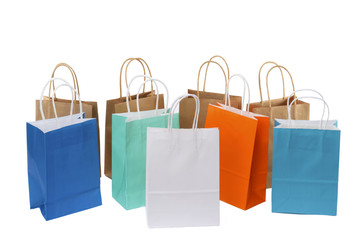 Paper shopping bags on white background