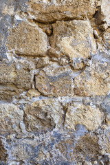 texture of the ancient castle wall of stone and granite