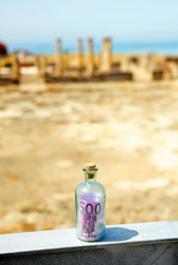 Obraz premium Old bottle with 500 euro inside. Money and tourism