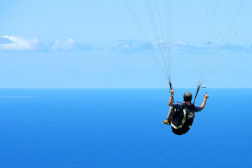 Fototapeta premium Parapente vers l'océan
