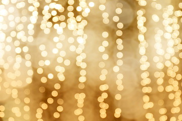 Lighting bokeh gold bright Christmas happy new year Background, Glamour Gold color background,...