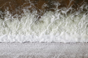 Water flowing splash fresh, Water flow Surface, Flowing water at Small reservoir, Rural water retention dam, splash, Sponge spray top view background