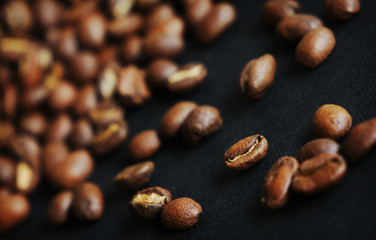 Beautiful background with scattered coffee beans