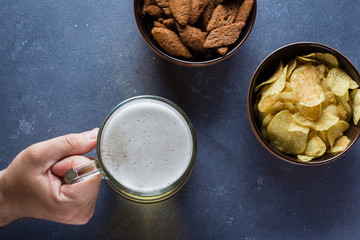 Appetizers and beer on the table for the football party and watch the football match. World Cup in Russia. Football Concept