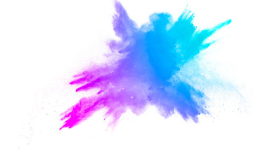 Fototapeta na wymiar Abstract blue-pink dust explosion on white background. Freeze motion of blue-pink powder splashing.