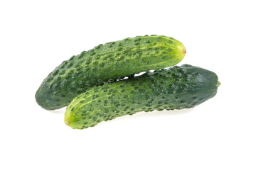 two cucumbers on a white background