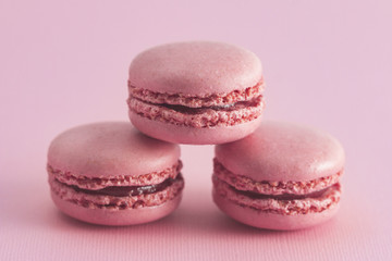 Pink French Macarons on a Pink Background