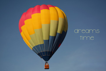 Dreams time concept. Hot air balloon colorful in sky