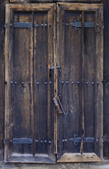 Old wooden door with locker