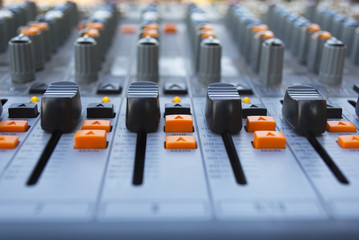 buttons equipment in audio recording outdoor studio of the orange colour.