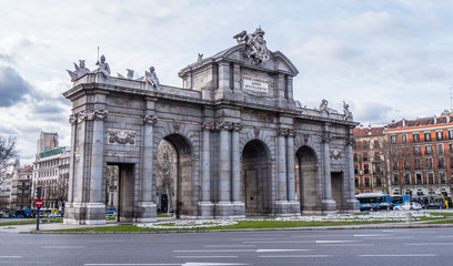 Fototapeta na wymiar Alcala Gate in Madrid called Puerta de Alcalá near Retiro Recreation Park