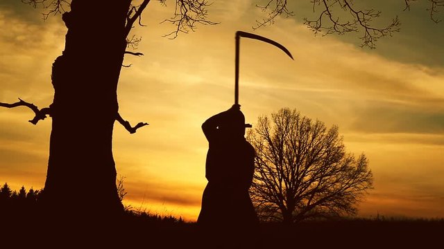 At sunset there is a grim Reaper