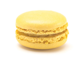 Single Yellow French Macarons on a White Background