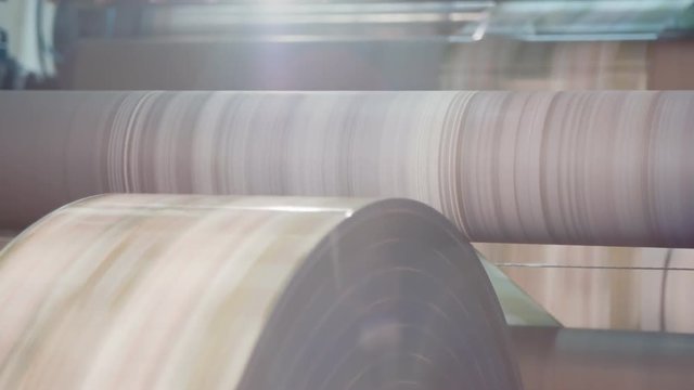 Printing press working at high speed in a large printing facility