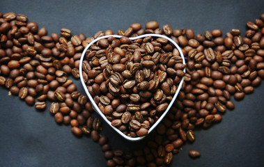 Beautiful background with scattered coffee beans