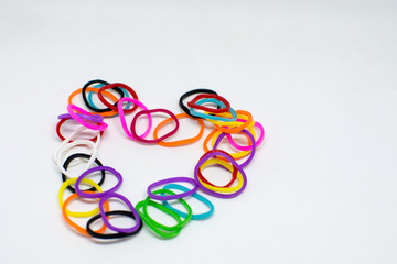 Naklejka premium Colorful background rainbow colors rubber bands loom