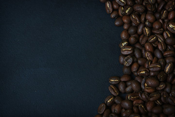 Beautiful background with scattered coffee beans