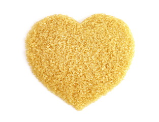 Heart-shaped of Sugar from sugar cane top view, Background granulated sugar yellow brown, Sucrose sugar, Red sugar