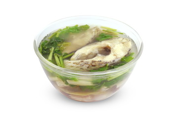 Boiled tilapia fish in clear bowl (Tom-yam-pla thai word), Piece slice fish soup spicy in cup, Thai food tilapia fish boiled hot and sour soup on white background
