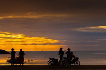 Fototapeta na wymiar Colorful sky of sunrise on the beach located at hua-hin south of thailand