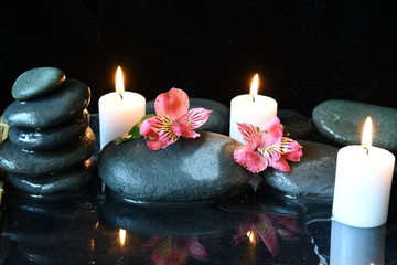 spa concept , flower on the rock near the candle