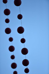 plastic balls attached to a rope