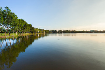landscape view of lake at sunset timing with tree located Bangkok Thailand  