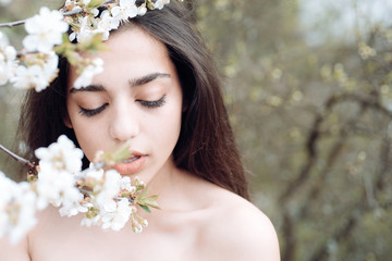 Skincare and freshness. Sensual woman with natural beauty look. Spring mood. Beautiful as flower. Arabian woman enjoy flower blossom. Womens day or 8 march