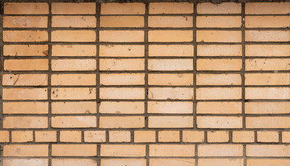Yellow masonry brick texture