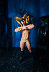  man  wearing golden horns in the studio