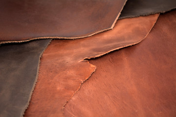 Texture of pieces brown leather. Natural material background