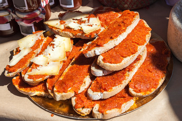 Bred with olive oil (pa amb oli) with sobrasada and cheese for sale in Porreres, Majorca, Spain