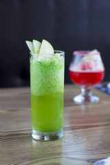 Green Apple Mocktail Non Alcoholic on wooden table