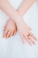 Woman wearing beautiful engagement ring with garnet