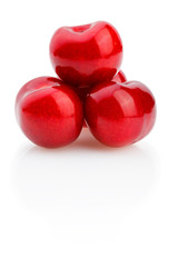 Juicy sweet cherry isolated on white background