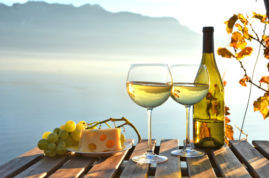 Fototapeta Wine against vineyards in Lavaux, Switzerland