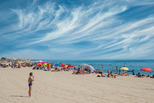 Sc&egrave;ne de vie Plage, enfant et ballon