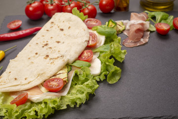 Piadina romagnola with cheese and ham