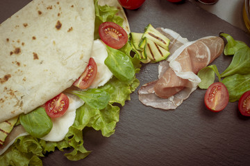 Piadina romagnola with cheese and ham