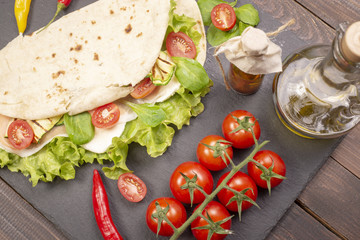 Piadina romagnola with cheese and ham