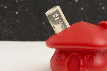Concept of saving to buy house.
