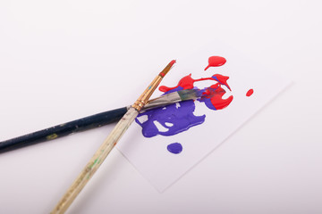 Paintbrushes with paint splatter 