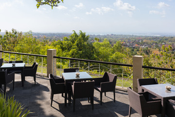 Tables with a panoramic view for the visitors of Garuda Wisnu Kencana Cultural Park