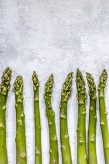 Asparagus on a concrete background