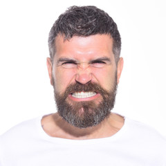 Obraz premium Angry man. Anger. Aggressive bearded man with stylish hair. Hipster with long beard and mustache with very angry and furious expression. Feeling and emotions. Man mad angry emotional portrait. Closeup