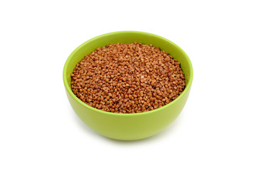 buckwheat in green plate on white background