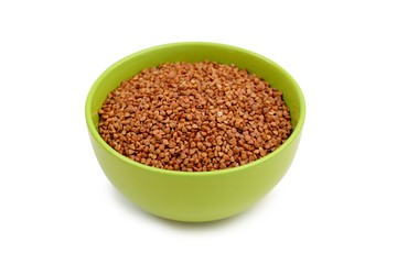 buckwheat in green plate on white background