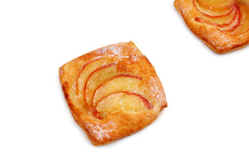 puff with slices of apples on a white background