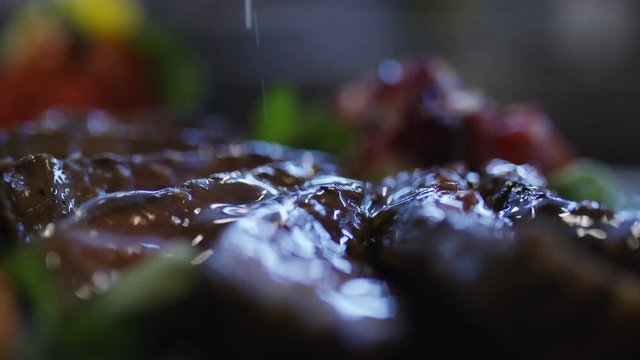 Cheff preparing meat meal in kitchen. 