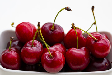 large beautiful cherry on a white background. Macro.